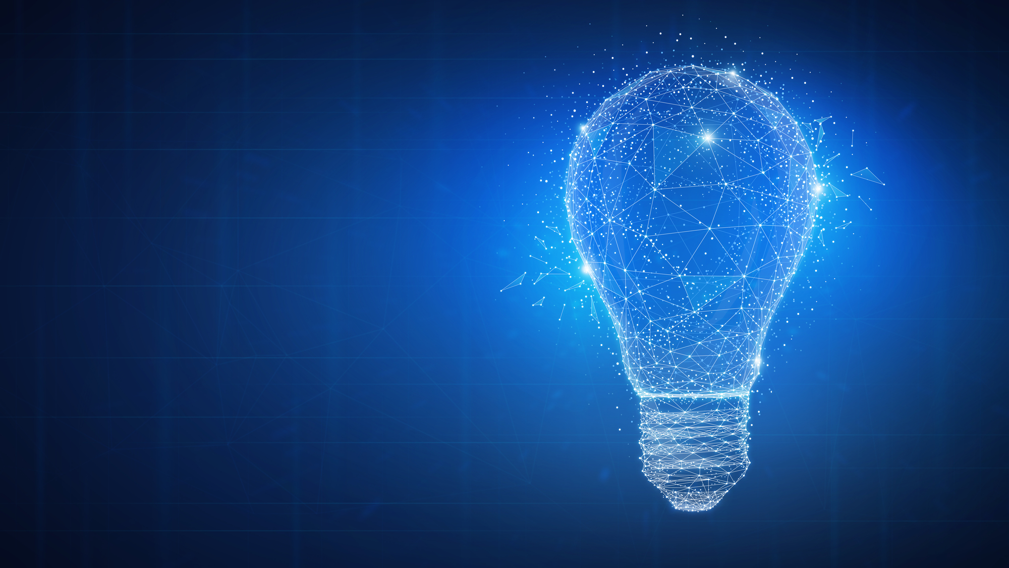 Digital light bulb made of network lines, representing AI for the workplace and business innovation.