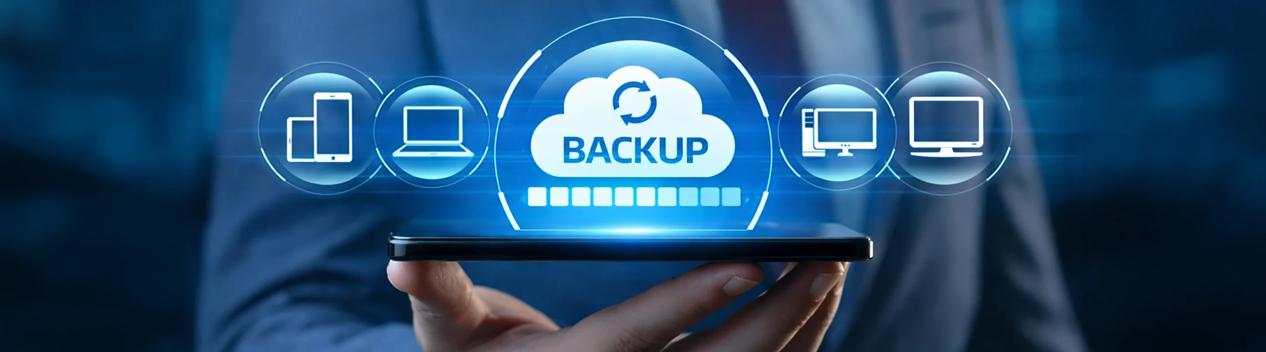 Cloud backup and disaster recovery concept displayed above a smartphone with connected device icons.